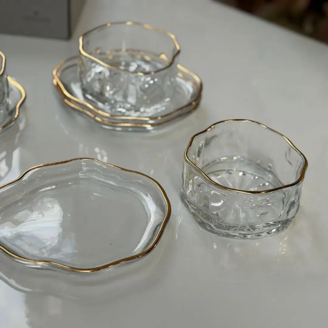طقم خشاف زجاج مموج إطار دهبي