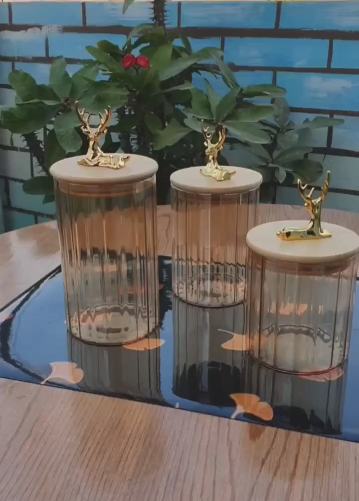 طقم برطمانات زجاج 3 قطع بغطاء خشبي ومقبض غزالة ذهبي